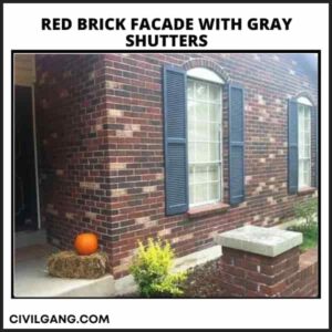 Red Brick Facade with Gray Shutters