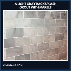 A Light Gray Backsplash Grout with Marble