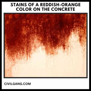Stains of a Reddish-Orange Color on the Concrete